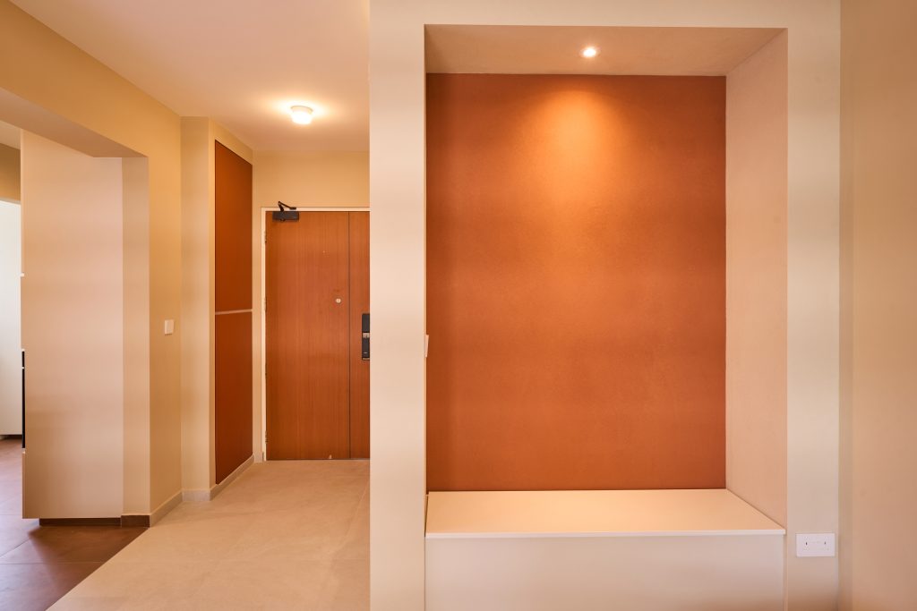 HDB renovation at 132B Canberra Singapore with cream walls and terracotta accents by Interior Diary