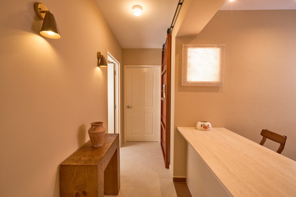 HDB renovation at 132B Canberra Singapore with cream walls and terracotta accents by Interior Diary