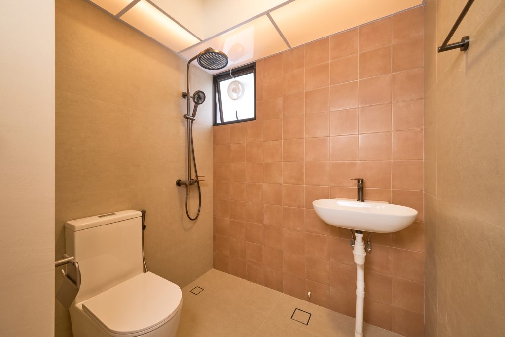 HDB renovation at 132B Canberra Singapore with cream walls and terracotta accents by Interior Diary