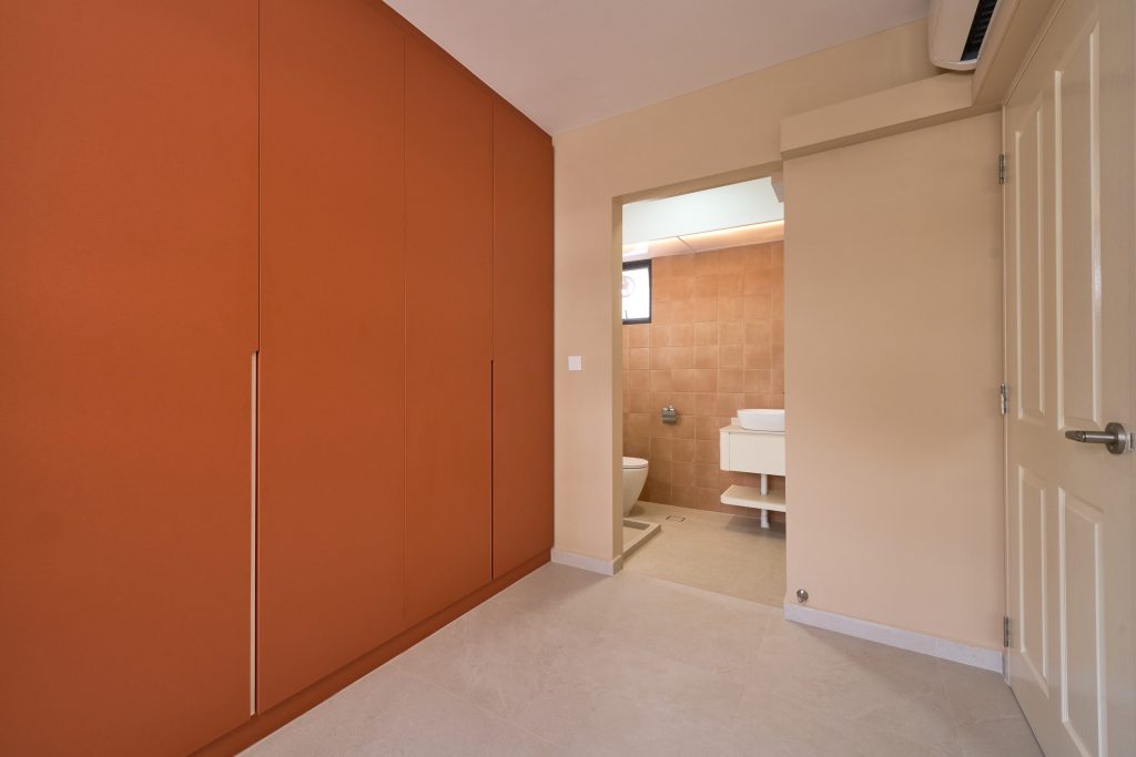 HDB renovation at 132B Canberra Singapore with cream walls and terracotta accents by Interior Diary