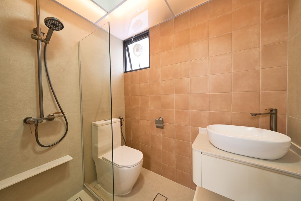 HDB renovation at 132B Canberra Singapore with cream walls and terracotta accents by Interior Diary