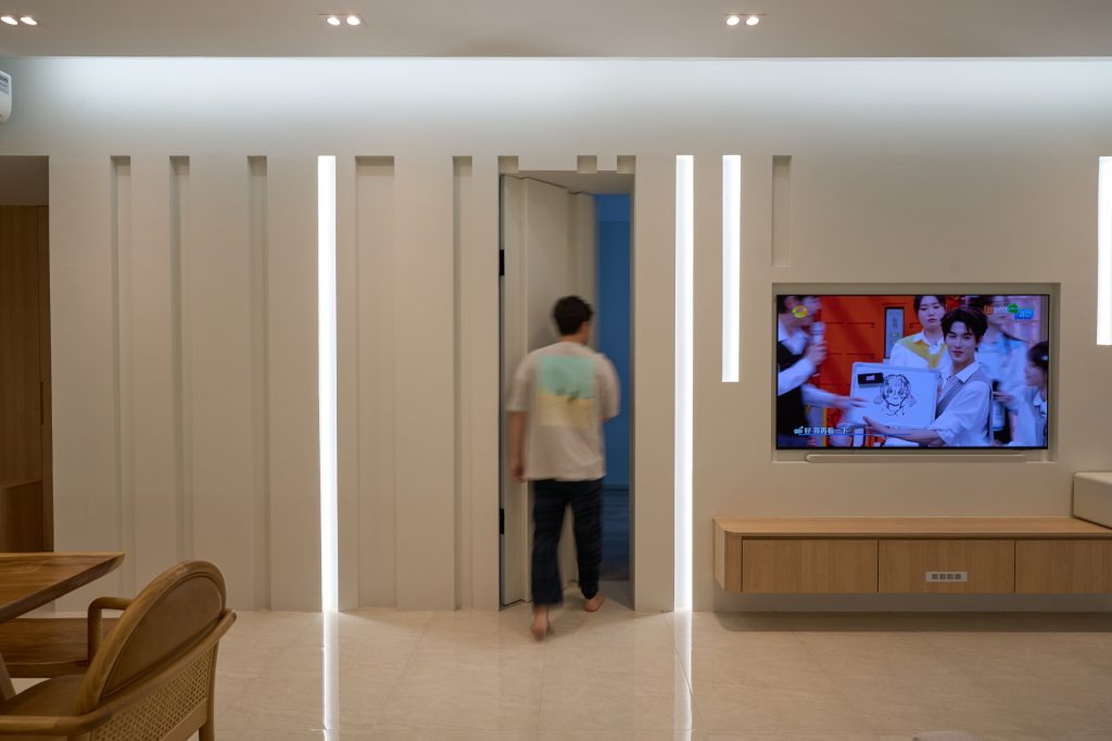 Condo renovation at 45 Canberra Drive Singapore with light oak carpentry and sage green walls by Interior Diary