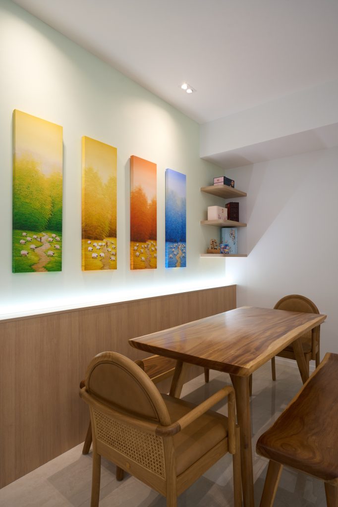 Condo renovation at 45 Canberra Drive Singapore with light oak carpentry and sage green walls by Interior Diary